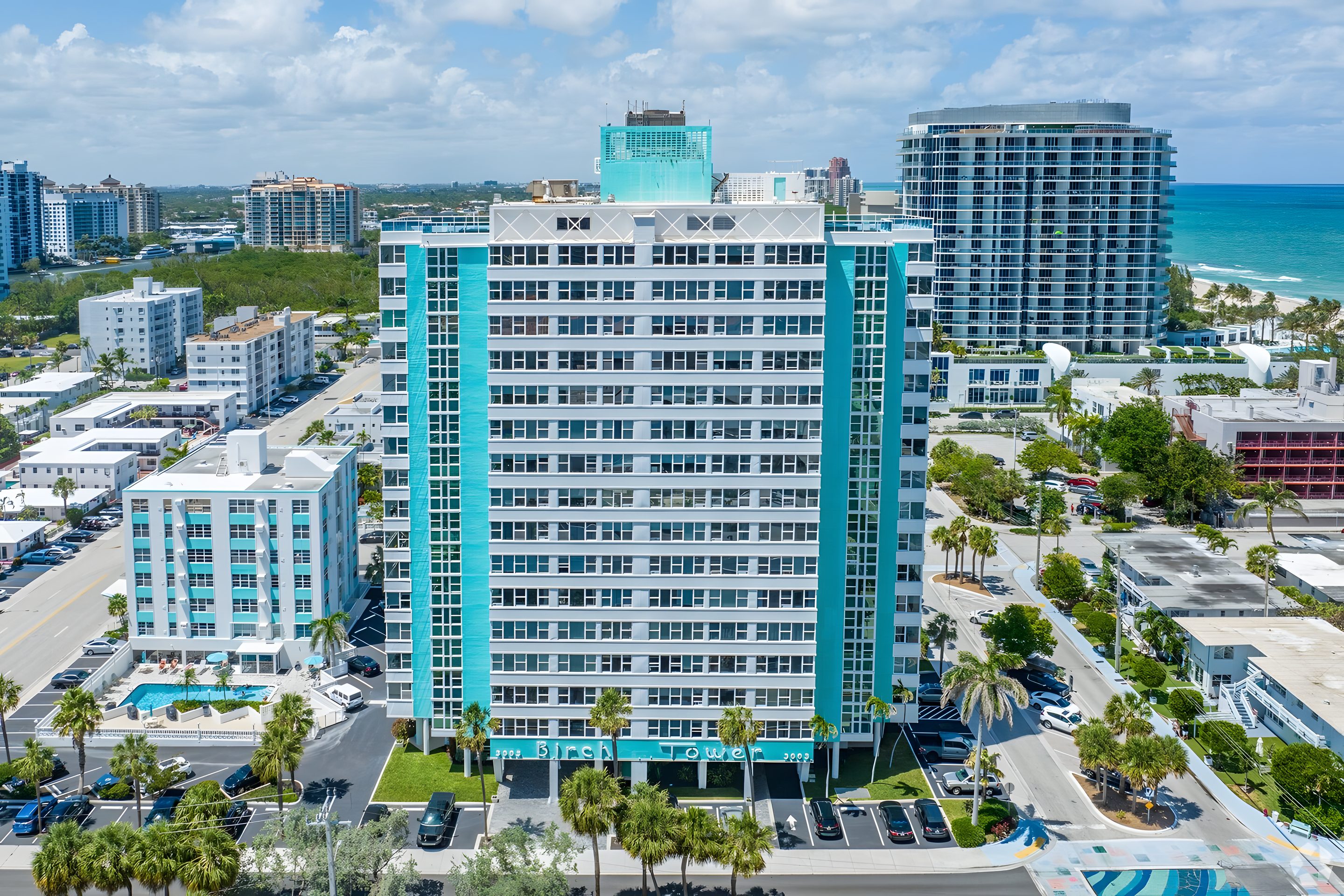 Birch Tower from the air, turquoise and white with the Atlantic directly behind it.